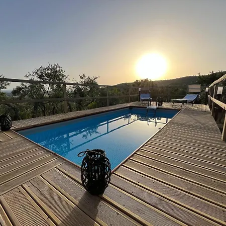 On A Picturesque Hillside, Breathtaking Views Of Cortone